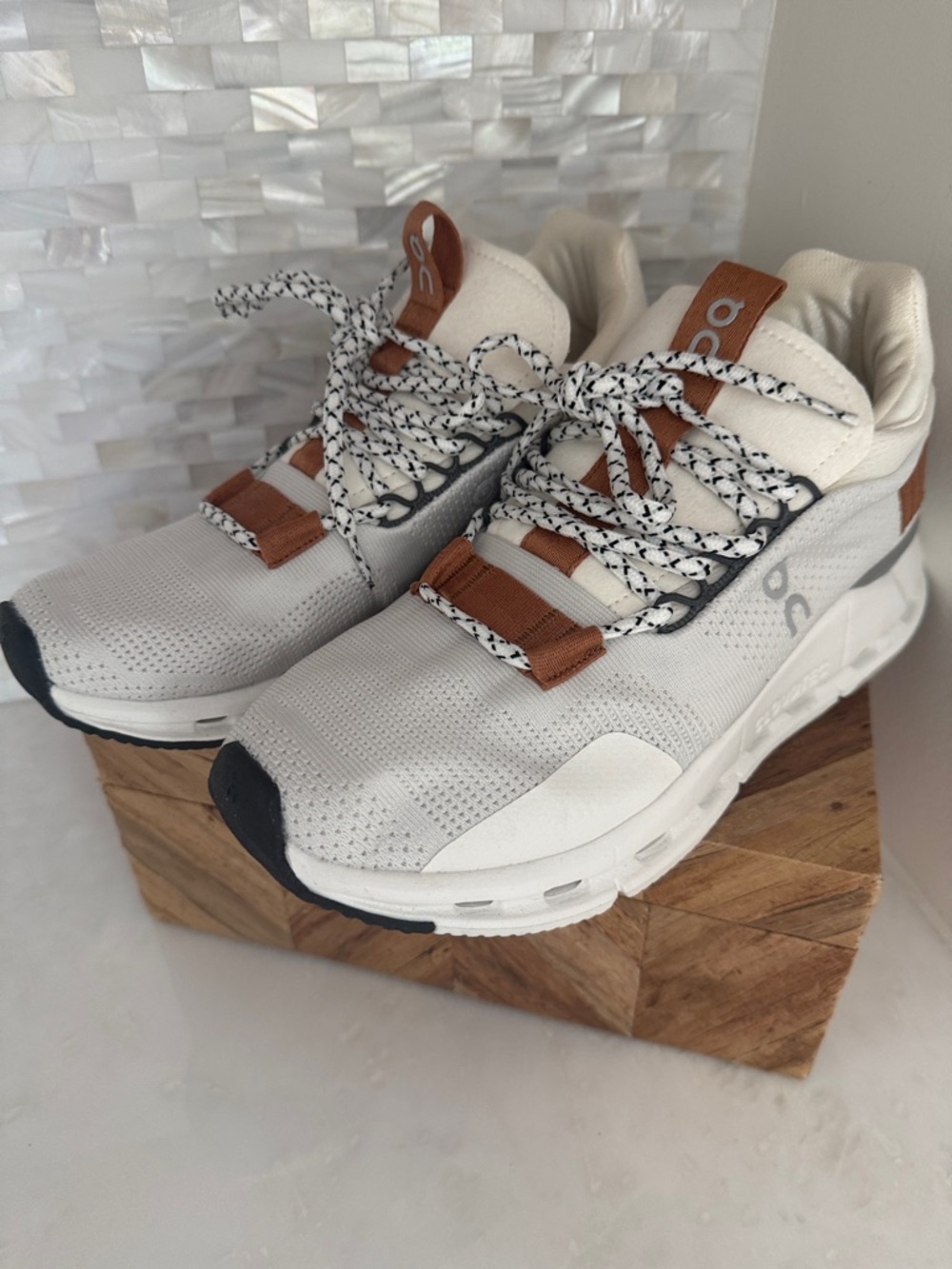 On Cloud Women’s Athletic Shoes in White with Tan Accents - Picture 3 of 6